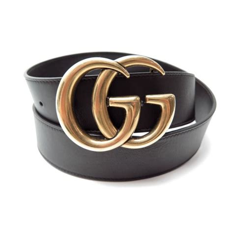 Ceinture dore GUCCI pour Femme .